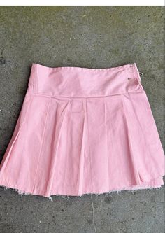 Denim, we love it. The Phobya Miniskirt, now as a Cupyyd In Soft Pink - just in time for summer. Hand crafted from top-quality sustainable denim and completely unique. Finished with the statement Safety Pin Closure. This skirt is designed to be uniquely worn, adjusting the pins to the wearer. - Safety Pin closure - One piece wrap skirt design - Micro-mini pleated skirt style - low-rise fitted waist - Pre-washed   - Sustainable dead-stock denim  - Available in grey and blue Y2k High Waist Cotton Skort, High Waist Pleated Cotton Denim Skirt, High Waist Cotton Denim Pleated Skirt, High Waist Pleated Denim Skirt In Cotton, High-waist Cotton Pleated Denim Skirt, High Waist Cotton Skirt For Summer, Cotton Denim Mini Skirt With Pleats, Cotton Pleated Mini Denim Skirt, Cotton Mini Skort For Summer