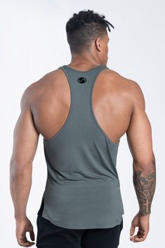 Model Specs: Casey is 5'11", 190lbs, and is wearing a Medium (TLF TACTIC PERFORMANCE BAMBOO TANK) Unequalled fit, style, performance, and comfort The low-cut racerback design provides a higher level of comfort and allows you to move freely Superior design provides the perfect muscle enhancing fit Contrasting chest logo and rear punched out upper center back logo Curved hem with side seam vents for added style Ultra-soft and light weight fabric for superior feel and comfort Fabric: Rayon from Bam Sporty Scoop Neck Tank Top With Built-in Padding, Scoop Neck Gym Tank Top With Built-in Padding, Scoop Neck Tank Top With Built-in Padding For Gym, Athleisure Activewear For Workout With Solid Back, Sporty Activewear For Workout With Solid Back, Sporty Activewear With Solid Back For Workout, Functional Scoop Back Activewear For Gym, Sporty Stretch Activewear, Athleisure T-back Top For Training