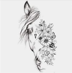 a horse with flowers on it's face and the word love written in black ink