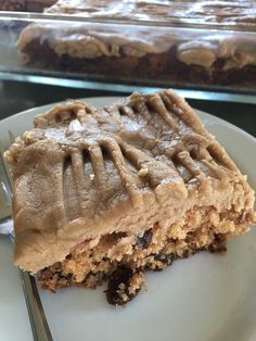 a piece of cake sitting on top of a white plate