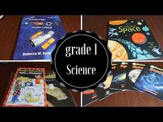 four different books with the words grade science written in black and white, on top of them