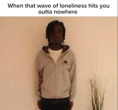 a person standing in front of a wall with the caption when that wave of loneness hits you outa nowhere