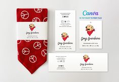 a red tie and business cards on a white background with the logo for dog grooming