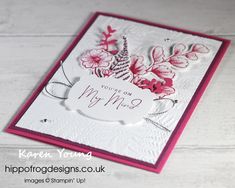 a close up of a card with flowers on it