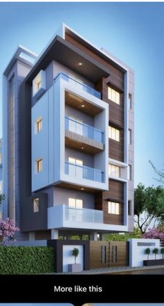 an apartment building with balconies on the second floor and windows in the middle