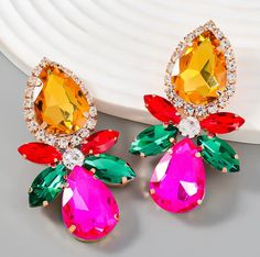 These trendy Multicolor Rhinestone Statement earrings are the perfect accessory for any event. Pageants, Prom, Bridal, Wedding Day, Mothers Day, Tv Show, On stage earrings, Gifts for her, Trending Spring Must Have Earrings.Earring Color: Multi ColorEarring Length: 3inches Earring Type: Pierced/ Post Back Hong Kong Wedding, Blessed Wednesday, Embellished Fashion, Multicolor Earrings, Spring Earrings, Rhinestone Decor, Rhinestone Earrings, On Stage, Bridal Wedding