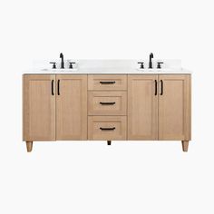 the double sink vanity has two black faucets on each side and one white counter top