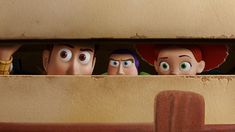 five animated characters peeking out from behind a wall