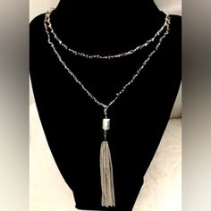 Stella & Dot Gitane Tassel-Silver Neutral Multi Necklace Brand New In Sd Box. Condition Is "New With Tags". Shipped With Usps First Class. Great Layering Necklace, 471/2” Long. The Necklace Is Silver And The Tassel Is Removable To Give It A Different Look. There Is A Clasp To Convert It Into Two Tier Necklace. - Beaded Layering Necklace - Can Be Worn Long Or In Two - Removable Tassel - Retired/Vintage Piece Silver Bohemian Lariat Tassel Necklace, Adjustable Beaded Chain Tassel Necklace As Gift, Silver Bohemian Tassel Necklace For Party, Adjustable Silver Bohemian Tassel Necklace, Adjustable Metal Tassel Necklace As Gift, Bohemian Silver Adjustable Tassel Necklace, Bohemian Adjustable Silver Tassel Necklace, Silver Metal Tassel Necklace With Adjustable Chain, Silver Tassel Necklace With Adjustable Chain