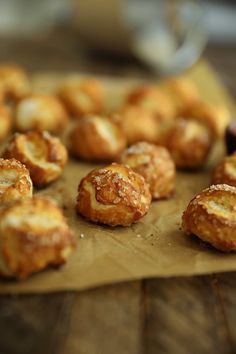 small pastries sitting on top of a piece of paper