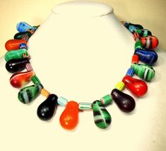 "AFRICAN Dom Dom Sele Wedding Beads CHOKER with Colorful Antique Chevron Beads, All Glass, So Colorful , Rachelle Starr OOAK Necklace This Vintage African Trade Bead Necklace features old Mali Glass DOM DOM ( light bulb shaped Wedding Beads )and old chevron tube beads in My design! This necklace is 16\" long (40.64cm ) The very old glass light bulb shaped african wedding beads ( Called DOM DOM SELE) were originally from Czechoslovakia, brought to Africa as ballast in ships and traded way back fr Chevron Beads, Beads Choker, African Trade Beads, Glass Light, Trade Beads, African Wedding, Beaded Dangle Earrings, Tube Beads, Small Jewelry