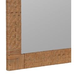 a mirror that is made out of wood and has a wicker border around it