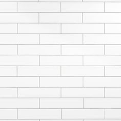 a white tiled wall with no one in it