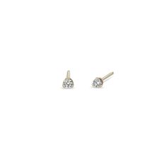 14k gold small prong set round diamond solitaire stud earrings SPECIFICS • round diamonds are approx. 2.4mm• white diamonds .10 ctw for the pair, .05 ctw for a single• sold as a pair or single Solitaire Studs, Ring Size Guide, Diamond Sizes, Round Earrings, White Diamonds, 14kt Gold, Diamond Solitaire, Diamond Studs, Bracelet Sizes