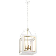 a white and gold lantern hanging from the ceiling