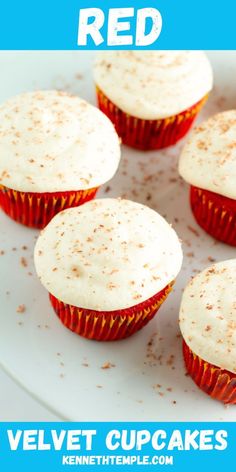 red velvet cupcakes with white frosting on a plate