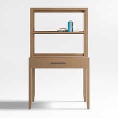 a wooden shelf with books on it and a book case below the shelf is empty