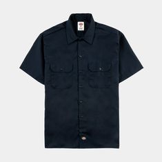 Rooted in time honored tradition, Dickies 1574 Short Sleeve Work Shirt offers a long-standing promise of quality and comfort that can't be beat. As one of the earliest produced Dickies products from over 90 years ago, the 1574 encapsulates the authentic heritage of the original iconic work shirt. Constructed from a sturdy cotton/poly twill, workers worldwide have put their trust in the 1574 for its tireless pledge to function and durability. The timeless design features extra room throughout the Classic Solid Camp Shirt With Button Closure, Classic Solid Cotton Camp Shirt, Classic Cotton Camp Shirt, Classic Navy Tops With Button Closure, Classic Navy Top With Button Closure, Classic Navy Button-up Top, Classic Long Sleeve Cotton Camp Shirt, Classic Navy Short Sleeve Top, Classic Crew Neck Shirt For Work