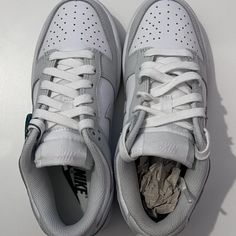 Nike Women's Size 5 Low Dunks Have Never Been Worn. Gray And White. Low Dunks. Nike Skate Shoes With Perforations And Round Toe, Nike Skate Shoes With Perforations, Nike Shoes Gray, Air Max 90 Blue, White Huaraches, Air Max 90 Black, Low Dunks, Nike Flyknit Racer, Nike Max