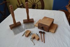 wooden tools are laid out on a table