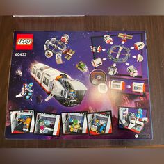 the box is open to reveal lego's space station