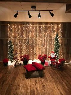 a room decorated for christmas with lights and decorations