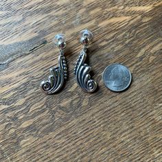 This is a replica of a design from the 1930's and 40's, which is currently being made in Taxco. This remake is much lighter than the old-time jewelry and contains less silver, but the workmanship is excellent and the price is much more affordable than the heavy vintage pieces of old. These earrings have posts and a very nice, large backing for the post to make sure it stays in place. Absolutely wonderful. 950 Sterling. Muy Mexicana. state of origin: Taxco, Guerrerodimensions: about 2" long and a Taxco Silver Jewelry, State Of Origin, Time Jewelry, Fiesta Party Decorations, Mexican Folk Art, Christmas Jewelry, Vintage Pieces, A Design, Traditional Art