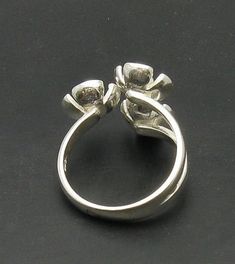 Sterling silver ring 925/1000, flower. Stamped 925.Approximate weight 4.9 grams. Top width 2.0 cm (0.80 inches). All our jewels are made from solid sterling silver 925/1000 and are carefully crafted by hand in our family workshop. We dispatch your orders in 5 working days, worldwide and the postage is $5. We ship registered priority mail. Please allow 5-7 working days for delivery in Europe and 10-15 working days outside Europe. For any questions - please do not hesitate to contact me! Silver Open Ring Flower Design For Anniversary, Hallmarked Open Flower Ring For Anniversary, Hallmarked Flower Open Ring For Anniversary, Silver Sterling Flower Ring For Anniversary, Hallmarked Sterling Silver Flower Ring, Sterling Silver Flower Ring With Polished Finish, Silver Sterling Silver Flower Ring For Anniversary, Silver Sterling Silver Flower Ring With Polished Finish, Hallmarked Silver Flower Ring