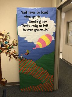 a bulletin board with an image of a hot air balloon in the sky on it