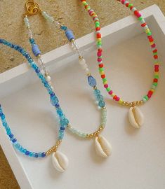 This how necklace comes in three styles and are 15 inches long. All jewelry comes with a Beaded by Sandy care card explaining the best ways to take care of your jewelry.  Designed and handmade just for you in the USA. About the brand: Based in South Texas, Beaded by Sandy crafts unique beaded jewelry, led by an aspired entrepreneur and student, embodying female empowerment and Latina ownership. Seashell Bead Necklace, Unique Beaded Jewelry, Crafts Unique, Small Bead Bracelet, South Texas, Female Empowerment, Care Card, Beaded Necklaces, Bead Bracelet