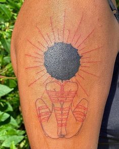 an elephant tattoo on the back of a man's arm with sunburst