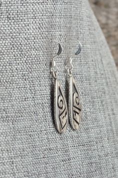 These sterling silver earrings were made by Hopi silversmith Augustine Mowa. The back is stamped sterling.Length: 1 1/2"Width: 1/2"Free shipping on all orders! We ship with USPS and always include tracking. All orders ship within a day of payment.Returns are accepted up to 30 days after you receive your order. Just send us a message. Our shop offers cash back or store credit. The item must be returned in new condition. Native American Jewelry, Free Jewelry, Sterling Silver Earrings, Silver Earrings, Personalized Items, Stamp, Sterling Silver, Silver