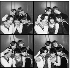 black and white photo of group of young men posing for camera in front of mirror