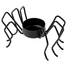 a black spider pot holder is shown on the white background, it has four legs and two