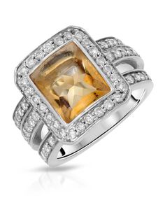 ITEM INFORMATION Collection Glamour Product Type Ring Condition New Gender Women's Total Item Weight 11.5 grams (approx.) Total Carat Weight 4.11ctw (approx.) Product Dimensions W 13.00mm x H 5.50mm MATERIAL INFORMATION Material Type(s) 14k White Gold PRIMARY GEMSTONE INFO Gemstone Honey Citrine / 1 pcs Composition Natural Total Carat Weight Approx. 3.03ct Shape and Cut Freeform Special Cut Color Grade Yellow Setting Type Bezel SECONDARY GEMSTONE INFO Gemstone Diamond / 68 pcs Total Carat Weight Natural Honey, November Birthstone, Color Grading, Cocktail Ring, Cut And Color, Cocktail Rings, Citrine, Gold Diamond, Heart Ring