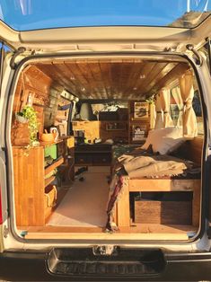 the back end of a van filled with furniture