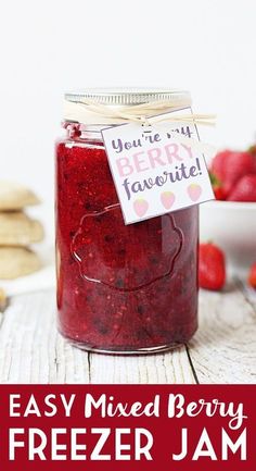 a mason jar filled with strawberry freezer jam