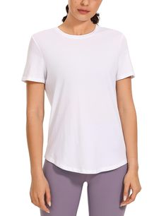 PRICES MAY VARY. Designed for low-impact workouts or daily wear. Super soft, skin-friendly and lightweight fabric keeps you comfortable. Classic fit, hip length. Classic round neck design, seamless double needle collar for comfortable fit. Basic short-sleeved shirt with a moderate length curved hem, easy to pair with any trouser. Pima Cotton collection is super soft and feels great against your skin, aiming to offer a comfortable feeling to you. Classic round neck design with long curved hem, lo Breathable Yoga T-shirt, Cotton Short Sleeve Activewear For Light Exercise, Cotton Short Sleeve Activewear For Exercise, Athletic Fit Yoga Tops, Stretch Moisture-wicking T-shirt For Pilates, Moisture-wicking T-shirt For Pilates, Casual Short Sleeve Tops For Pilates, Stretch Athleisure T-shirt For Pilates, Moisture-wicking Sporty T-shirt For Pilates