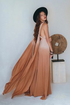 This boho macrame bridesmaid dress is a luxurious garment that has a multi-tiered structure, a train and elements on the shoulders and belt made in the macrame technique. This bohemian dress will complement the image of any lady with its sophistication, grace and flowing lines reminiscent of wings. The boho dress is made of a light and structured homespun cotton fabric. The complex image from the back is harmoniously combined with the front of the dress, making the image casual and possible for Boho Bridesmaid Dress Bohemian, Bohemian Prom Dress, Bohemian Prom, Dress Goddess, Dusty Pink Bridesmaid Dresses, Multiway Dress, Grecian Dress, Bridesmaid Dresses Boho, Multi Way Dress