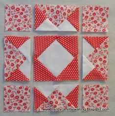 the squares are made up of red and white fabric