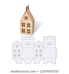 an image of paper cut out of a house and two buildings with windows on each side