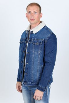 SIZE CHART Measurements: Model is wearing size Medium. A stylish and versatile denim jacket that is perfect for the colder months. The faux shearling lining keeps you warm and cozy, while the denim exterior is durable and stylish. This jacket features a long-sleeve design with a button placket and two buttoned pockets on the chest. It also has two hand pockets and cuffs with buttons. The jacket is made of denim and has a shearling-lined collar. The jacket is perfect for everyday wear and can be Sherpa Lined Denim Jacket, Mens Sherpa, Lined Denim Jacket, Kids Outerwear, Dark Blue Color, Blazers For Men, Sherpa Lined, Mens Outerwear, T-shirt Polos