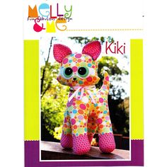 an image of a stuffed animal that looks like a cat with polka dots on it