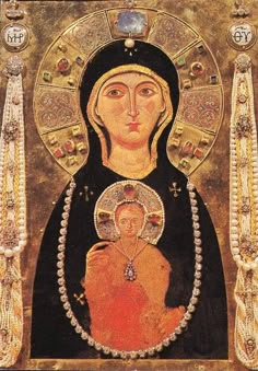 an icon with the virgin mary and child jesus in gold, black and red colors