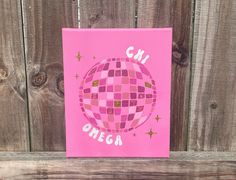 8" x 10" Disco Sorority Canvas, customizable for any sorority. It is an excellent addition to your big/little baskets and a great gift. These canvases are also perfect for dorm, apartment, or house decorations! Sororities available include: ★ Alpha Delta Pi ★ ★ Chi Omega ★ ★ Delta Delta Delta ★ ★ Delta Gamma ★ ★ Delta Phi Epsilon ★ ★ Delta Zeta ★ ★ Kappa Delta ★ ★ Kappa Kappa Gamma ★ ★ Pi Beta Phi ★ ★ Sigma Delta Tau ★  ★ Sigma Sigma Sigma ★ ★ Theta Phi Alpha ★ ArtByFeliciaStudio products are made-to-order and hand-painted, and the color placement of the disco ball may vary from photos. Please allow 1-3 business days for your items to be prepared for shipping. All canvases purchased in the United States are shipped via USPS Ground Mail by default and include tracking. If preferred, you may Alpha Gamma Delta Big Little, Taylor Swift Sorority Canvas, Gphi Canvas Paintings, Big Little Canvas Sorority, Sorority Big Little Baskets, Axo Canvas, Alpha Chi Omega Canvas, Sorority Letters Painted