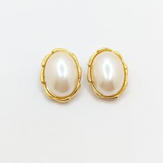 These faux pearl earrings are in good vintage condition. We pack and ship with care in a gift box. Luxury Oval Clip-on Earrings As Gift, Luxury Oval Clip-on Earrings With Polished Finish, Present For Her, Faux Pearl Earrings, Presents For Her, Minimal Jewelry, Adjustable Rings, Ring Bracelet, Clip On