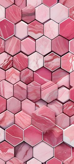 pink and white marble tiles are arranged in the shape of hexagonals,