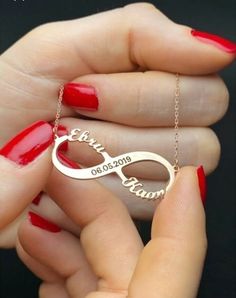 This 14K solid gold infinity name  and date necklace makes for a thoughtful and unique gift for a loved one . Whether you're celebrating a birthday , anniversary or just want to show your love , this neclace is sure to make a lasting impression. *FEATURES We are using real gold in our product for pendant and chain .  Material : 14 K Solid Gold  Colour : yellow gold   Charm dimentions : 3 cm x 1,5cm Chain Length : 14''-20'' upon your request  The open necklace laid straight & measured end to end. Infinity Necklace For Valentine's Day Personalized Gift, Customized Infinity Jewelry For Valentine's Day, Valentine's Day Infinity Jewelry With Custom Name, Infinity Shape Custom Name Necklace For Anniversary, Infinity Name Necklace For Anniversary Gift, Customizable Infinity Name Necklace For Anniversary, Custom Name Infinity Necklace For Anniversary Gift, Custom Name Infinity Necklace For Anniversary, Personalized Infinity Necklaces As Gifts