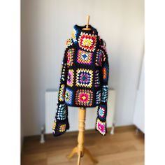 Hi! Winter is coming.❄️❄️ Would you like to meet him with a cotton handmade turtleneck sweater carefully knitted for you? ❤️❤️ With its soft texture, it has a structure that will warm you up on cold days. Vibrant eye-catching colors come together with the granny square to create this knit sweater. ❤️❤️ If you want to own it, now is the time, this cute knit sweater will suit you very well. YARN: High-Quality Cotton COLORS: Can be customized. Here shown in Black. In the notes to seller section, please tell me what colors you want. (Please note that light effect, monitor's brightness, contrast etc. May cause a slight color difference) SIZE: Model 173cm 5'8 M size Since this product is afghan knitting, it is created by combining different motifs. Each product is unique, there may be a differen Cozy Granny Square Sweater For Winter, Winter Granny Square Knit Sweater, Black Granny Square Sweater For Winter, Black Granny Square Sweater For Fall, Black Sweater With Granny Square For Fall, Purple Crochet Sweater, Crochet Grandma Square, Crochet Turtleneck Sweater, Crochet Turtleneck