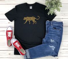 "* All shirts are unisex. * Product measurements may vary by up to 2 inches. * All Designs are originally made by myself or my team.  Cheetah shirt with the quote \"\" is a fun gift for men and women!  To see more designs of your topic Cheetah you can search & find them in the store:   https://www.etsy.com/shop/Retailorie  You find there also an announcement if the shipping & production times change :) cheetah shirt,cheetah gifts,wild animal shirt,african animal shirt,safari shirt,wildlife shirt,cheetah tshirt,cheetah t-shirt,cheetah tee shirt,cheetah t shirt," Leopard Print Short Sleeve Top For Streetwear, Cheetah Print Shirt Designs, Short Sleeve Leopard Print Tops For Streetwear, Graphic Tee With Crew Neck In Leopard Print, Graphic Tee With Leopard Print And Crew Neck, Cheetah Birthday Shirt, Leopard Print Graphic Tee With Crew Neck, Cute Teacher Shirts Cheetah, Black Crew Neck Top With Tiger Print